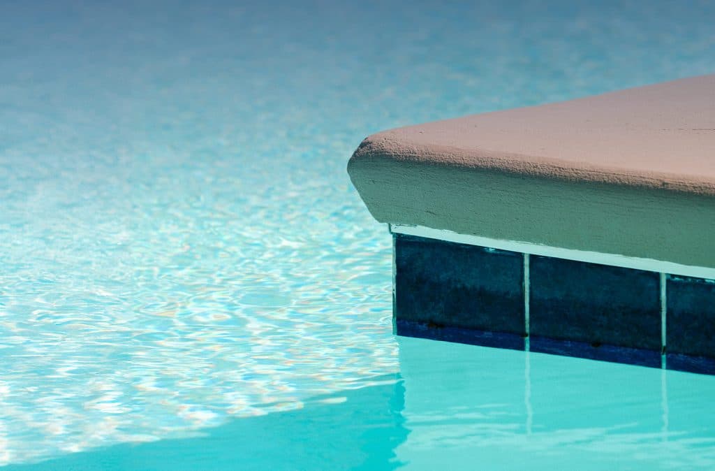 Calm pool water with ledge